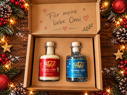 Weihnachtliche Geschenkpackung mit Eierlikör und Winter Gin